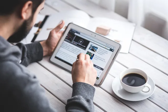 man, reading, touchscreen, blog, digital, tablet, coffee cup, working, screen, touching, touch, samsung, stylus, pen, technology, device, coffee, cup. Choosing a programmatic objective and buying method